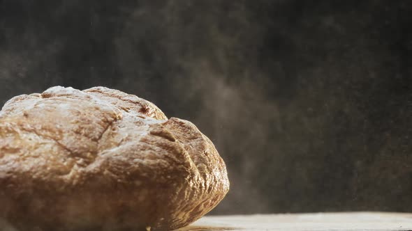 Tasty Homemade Rye Bread Loaf Falls Down Onto Table Macro