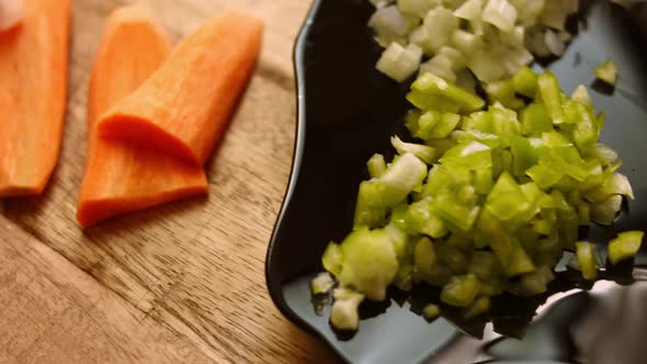 Chef Cuts Carrots for Salad with a Sharp Knife