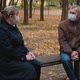 Senior Grandparents Couple in Medical Masks Sitting in Park - VideoHive Item for Sale