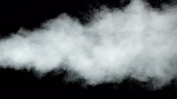 Water Vapor. White Jet of Vapour Steam Under Pressure on Black Background. 