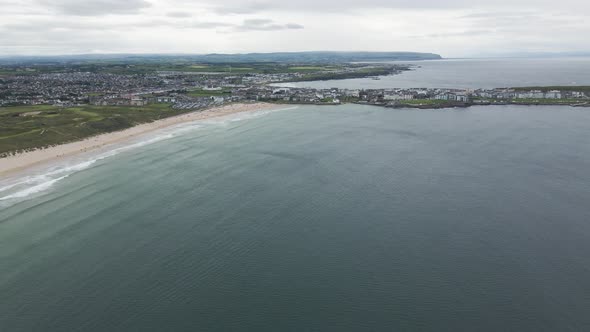 Calm tidal waters of Portrush Whiterocks beach Ireland aerial