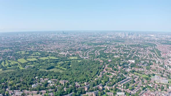 High drone shot over residential south London on a hot summer day