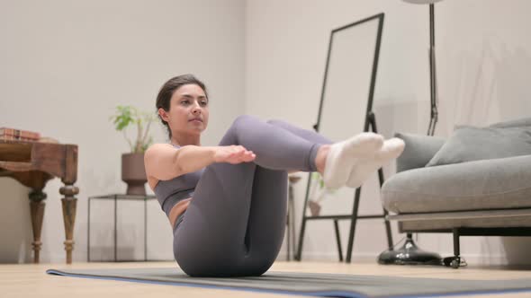 Young Indian Woman Doing Yoga on Yoga Mat at Home