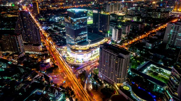 Bangkok business district city center above Samyan area and traffic, during night – Time Lapse