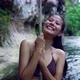 Cute Smiling Asian Girl in Bikini in the River By a Rope Thailand - VideoHive Item for Sale