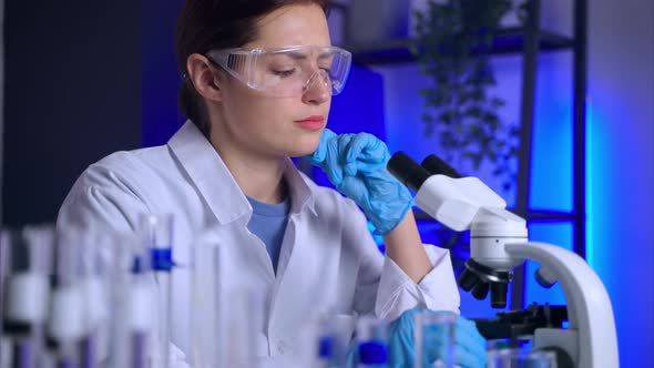 Forensic Examination or Medical Analysing in Laboratory Woman is Researching Samples