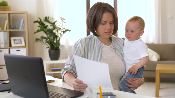 Working Mother with Baby Boy at Home Office 21