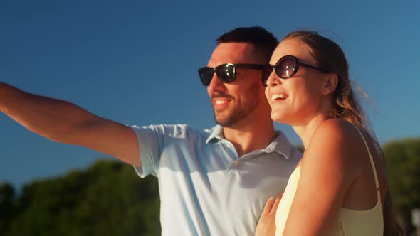 Happy Couple on Summer Beach