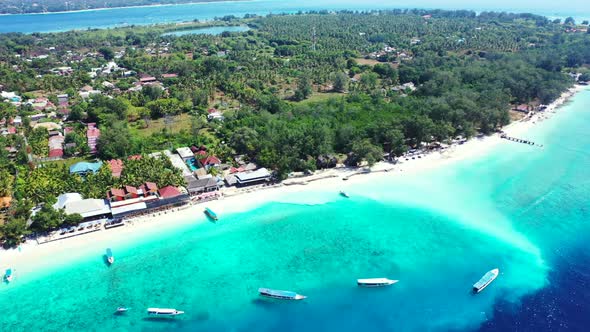 Aerial top down seascape of tranquil bay beach adventure by clear sea with clean sandy background of