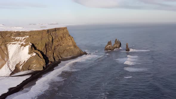 Reynisdrangar Columns and the Black Sand Beach in Iceland