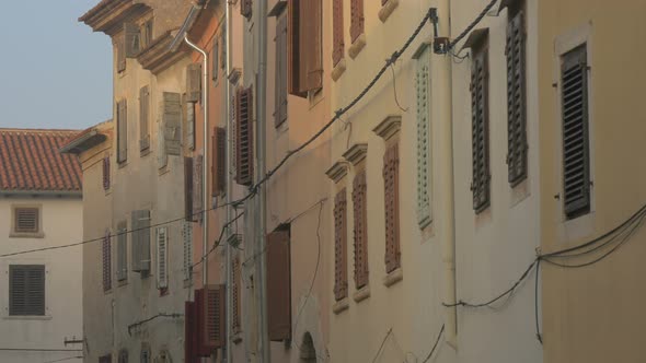 Buildings with window shutters