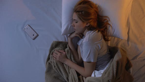 Exhausted Lady Turning Off Alarm Clock on Smartphone Lack of Energy, Sleepy Mood