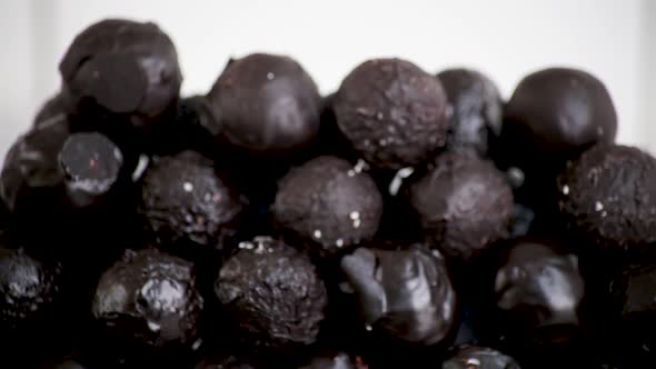 delicious black balls with coconut and chocolate