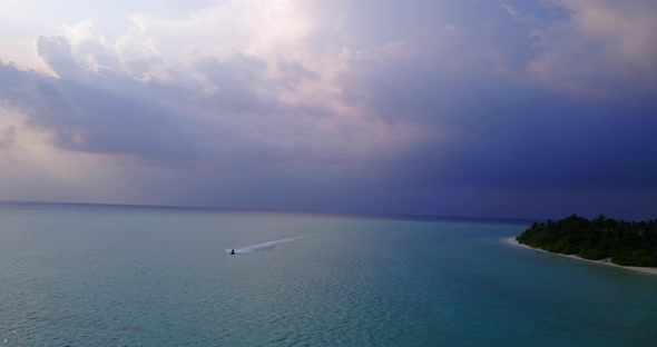 Tropical drone island view of a sunshine white sandy paradise beach and blue sea background in hi re