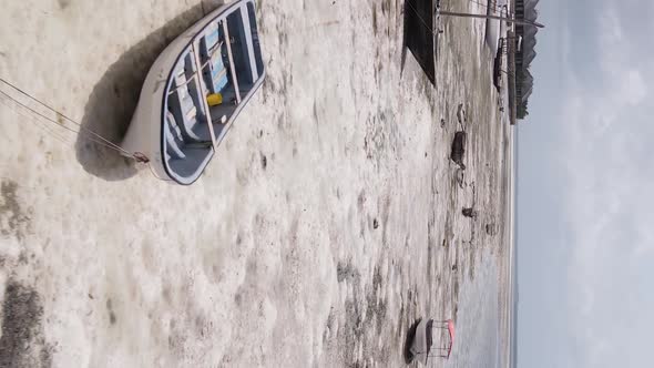 Vertical Video of Low Tide in the Ocean Near the Coast of Zanzibar Tanzania Aerial View