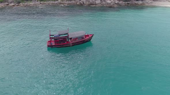 Red Ship on Water