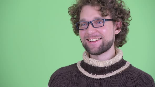 Face of Happy Young Bearded Man Thinking Ready for Winter