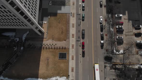 Bird's eye view over a street at Minneapolis downtown, cars going by