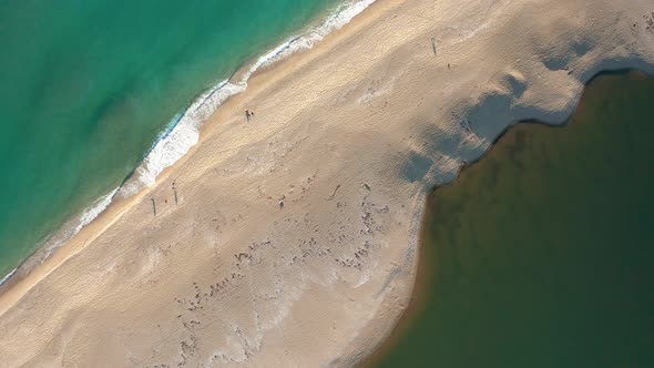 Exotic sandy beach surrounded by sea and river