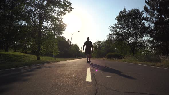 Sporty Man Walking on the Street