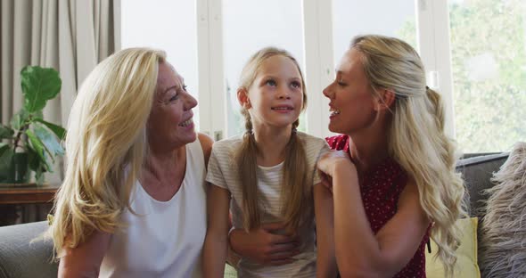 Caucasian woman spending time with her mother and her daughter