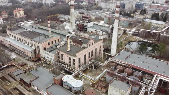 Aerial view of a drone flying over an industrial plant. Plant pipes