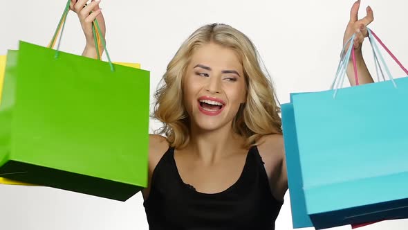 Beautiful Girl with Colorful Packages, Shopping, White, Slow Motion