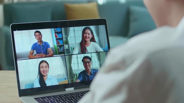 Close Up Of Asian Man Student Having Video Call With His Friends At Home