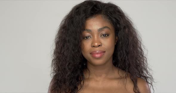 Cheerful Black Woman Looking at Camera