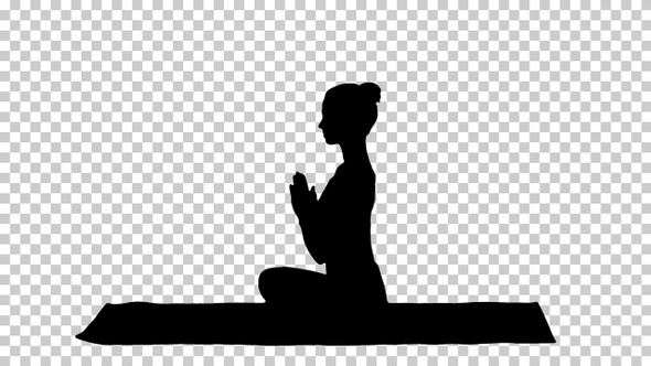 Silhouette Young sporty attractive woman practicing yoga