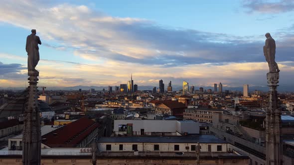 Aerial panoramic view of Milan skyline at sunset