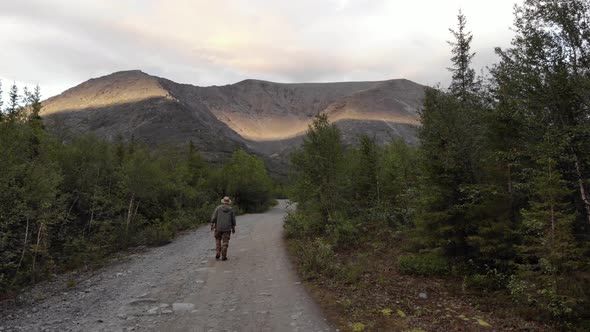 A Person Walking to the Largest Mountain Range on the Kola Peninsula