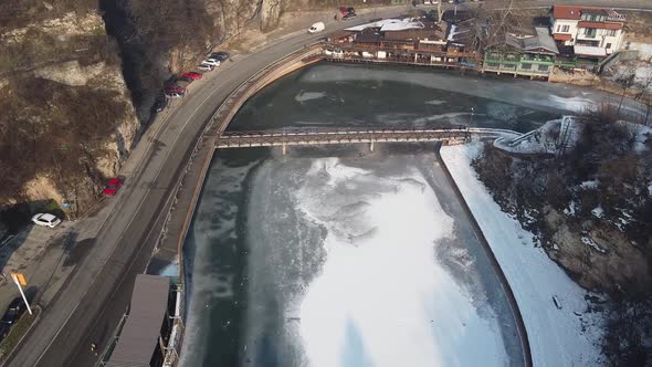 Bridge Over A Frozen River In Winter