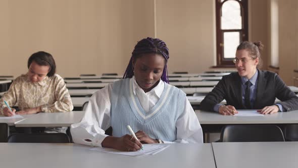 Diverse Students on Exam in Classroom