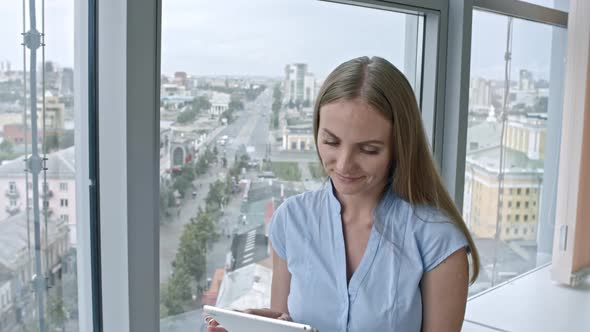 Female Worker Using Tablet