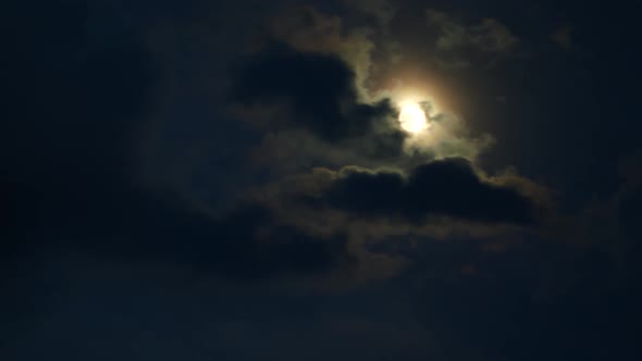 Timelapse of Full Moon Dark Dramatic Clouds in Night Sky Anamorphic Time Lapse