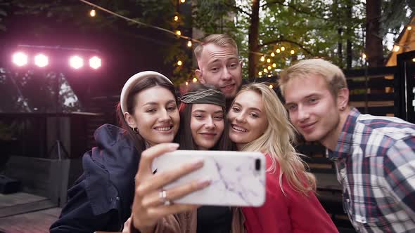 Joyful Caucasian Friends Enjoying Party, Posing and Making Funny Selfies