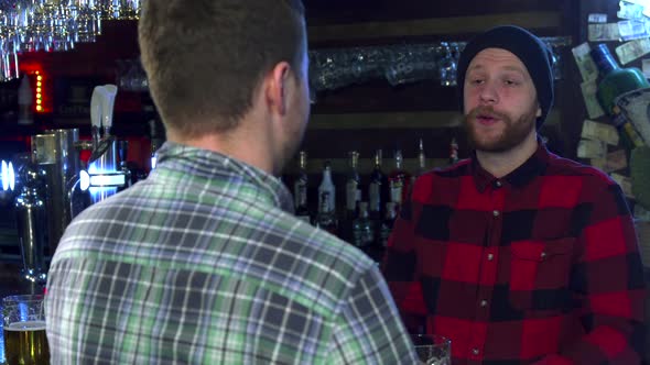 Two Friends Chatting at the Pub