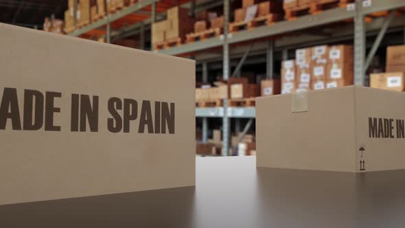 Boxes with MADE IN SPAIN Text on Conveyor