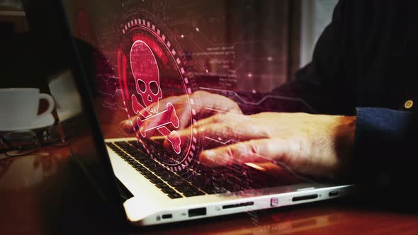 Skull pirate and online cyberattack symbol and man typing keyboard