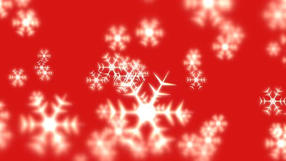 Snowflakes are falling slowly on red background