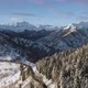 Forward Aerial Top View on White Snow Mountain Pass Valley in Winter - VideoHive Item for Sale