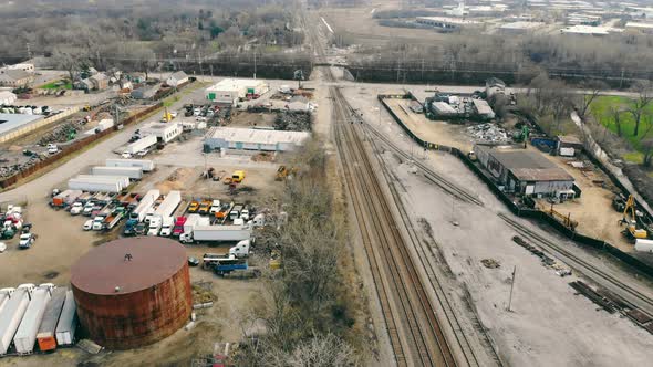 The Railway Track Approaching the Industrial Center of Production and Warehouses for the Storage of