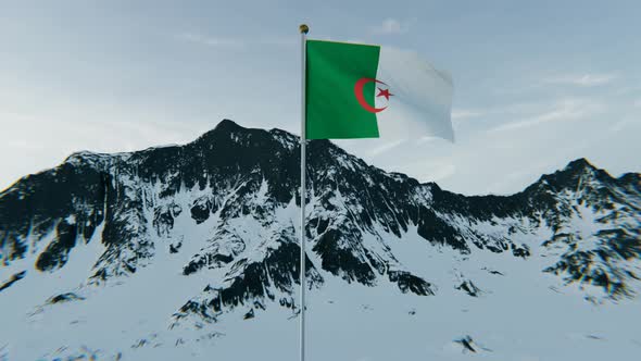 Algeria flag above the snowy mountains. 4K Aerial View
