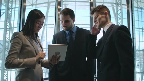 Colleagues in the Elevator