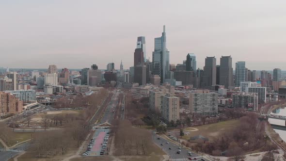 Aerial over Benjamin Franklin parkway in Philadelphia facing downtown skyline