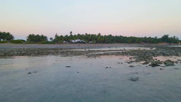 Exotic coral beach with a few tourists in saint martin island, Bangladesh. shallow calm water - Aeri