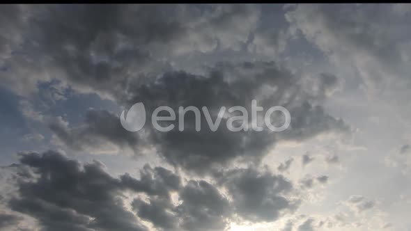 Dark Clouds With Sunset