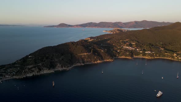 Aerial view of the coastline at sunset, Elba Island, Tuscany, Italy.