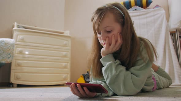 Girl Looking At The Phone